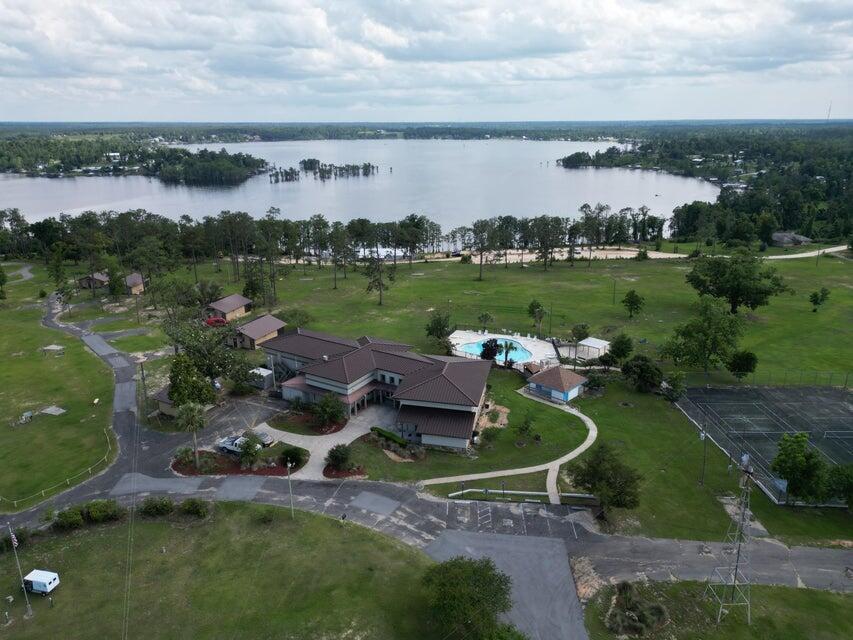 Lot 17 Dorcas Road Marianna, FL 32448 - Photo 6 of 18 an aerial view of a house with outdoor space lake view and mountain view in back