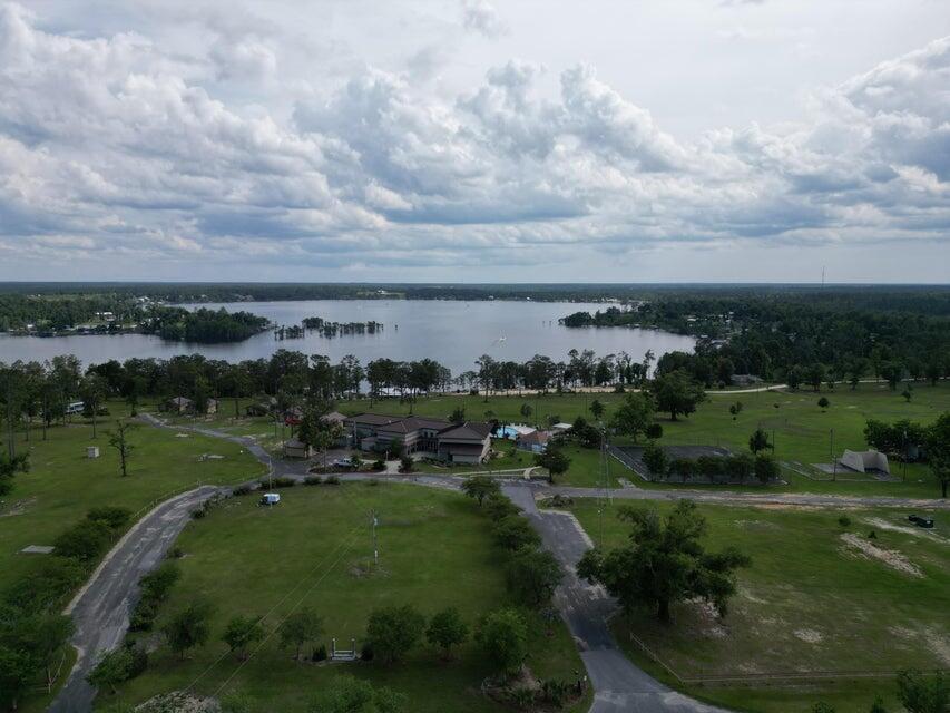 Lot 17 Dorcas Road Marianna, FL 32448 - Photo 7 of 18 an aerial view of residential houses with outdoor space and trees
