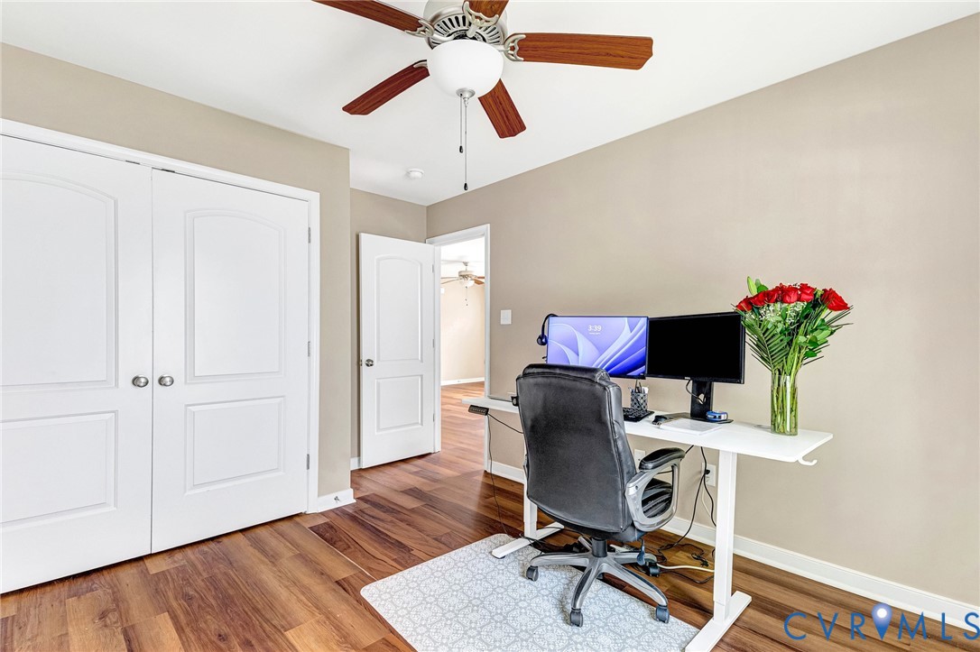 9925 Reymet Court Richmond, VA 23237 - Photo 23 of 30 a workspace with furniture and wooden floor