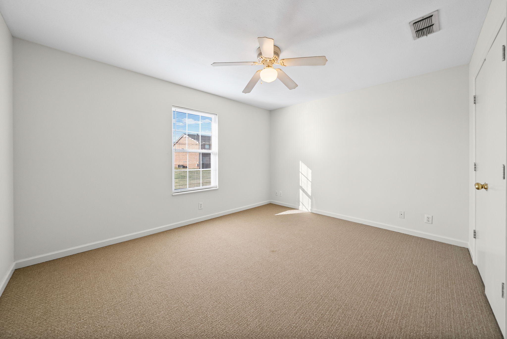 3300 Royster Lane, Unit C Clarksville, TN 37042 - Photo 12 of 18 an empty room with windows and fan