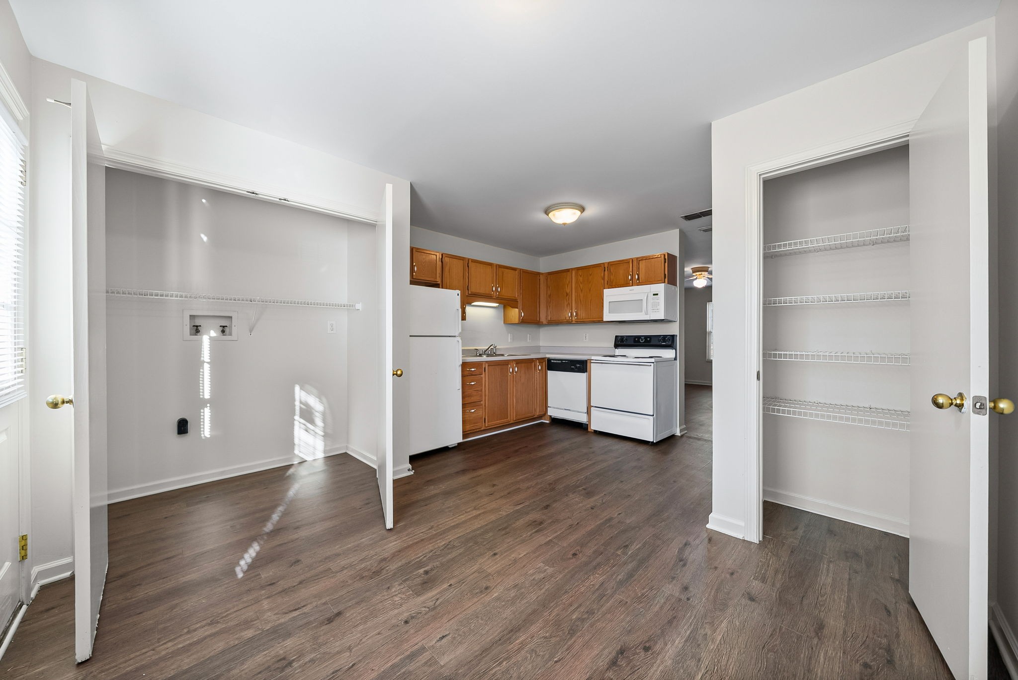 3300 Royster Lane, Unit C Clarksville, TN 37042 - Photo 9 of 18 a view of a kitchen with wooden floor and electronic appliances
