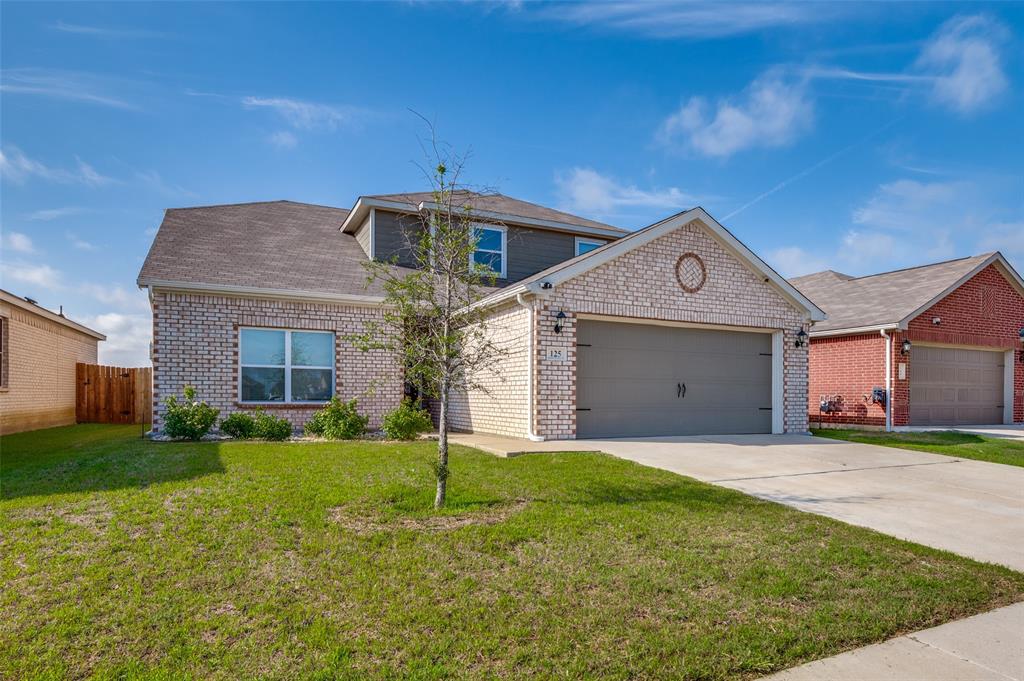 125 Sammy Venus, TX 76084 - Photo 2 of 39 Two-story residence featuring light-colored brick veneer and dark gray siding