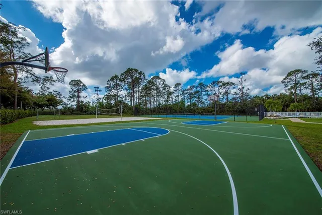 a view of a golf course with a lake