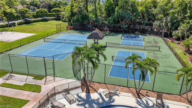 a view of a backyard with sitting area