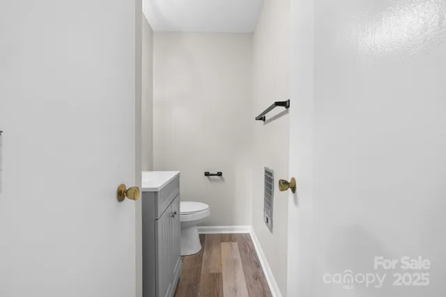 a bathroom with a sink and toilet