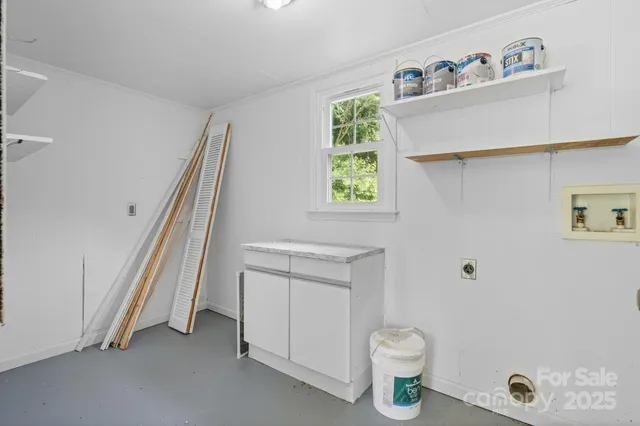 a bathroom with a sink a toilet and a shower