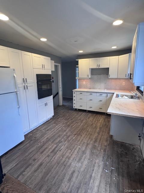 1134 Stony Brook Road Lake Grove, NY 11755 - Photo 4 of 18 a view of kitchen with sink microwave and refrigerator