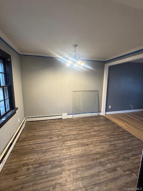 1134 Stony Brook Road Lake Grove, NY 11755 - Photo 6 of 18 a view of an empty room with window and wooden floor