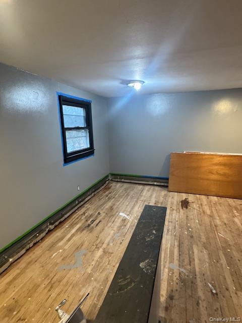 1134 Stony Brook Road Lake Grove, NY 11755 - Photo 10 of 18 a view of a room with a bed