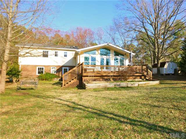 5412 Newhall Road Durham, NC 27713 - Photo 5 of 25 a front view of a house with a yard
