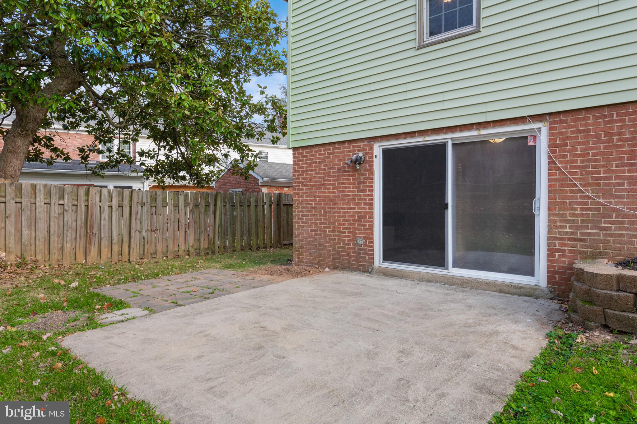 8403 Harker Drive Potomac, MD 20854 - Photo 33 of 33 a backyard of a house with green landscape