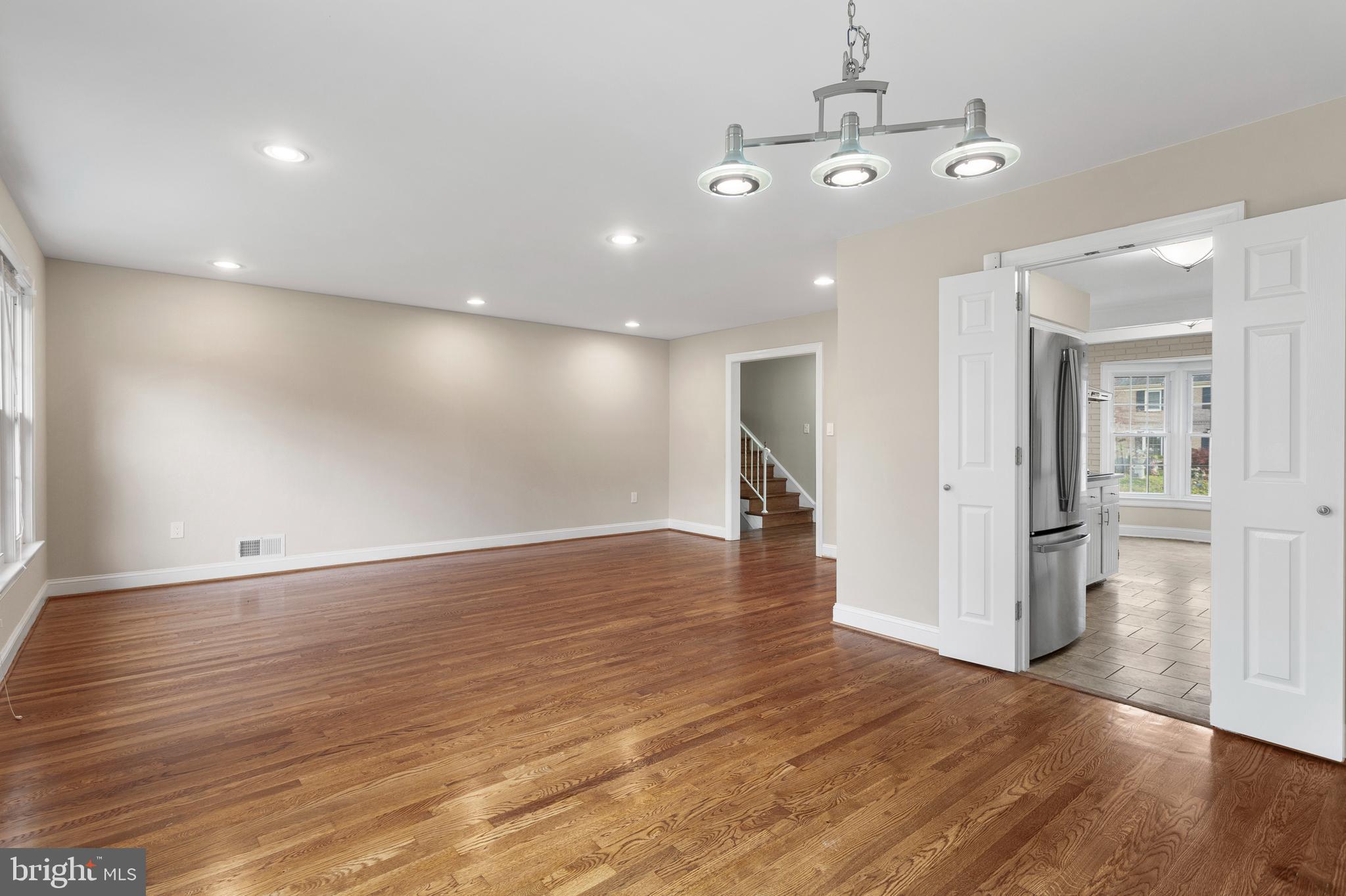 8403 Harker Drive Potomac, MD 20854 - Photo 4 of 33 a view of a room with wooden floor