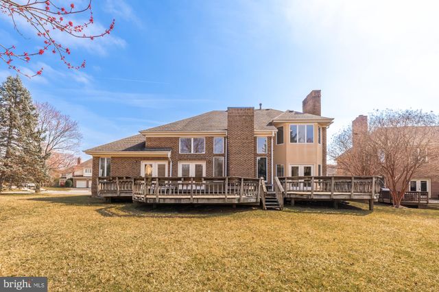 a view of a lake with a house