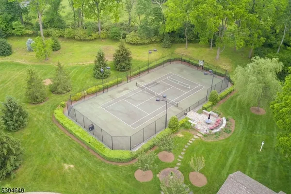 a view of a swimming pool with a yard