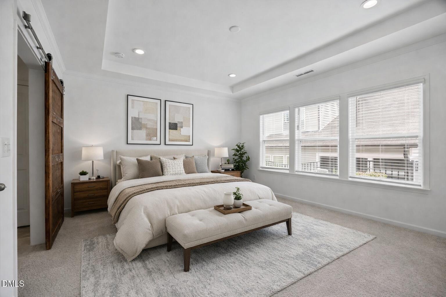 902 Talbot Place Durham, NC 27703 - Photo 25 of 49 a spacious bedroom with a bed and a large window