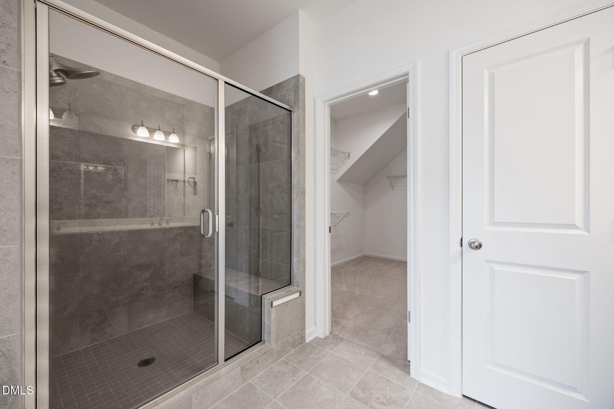 902 Talbot Place Durham, NC 27703 - Photo 29 of 49 a bathroom with a glass shower door