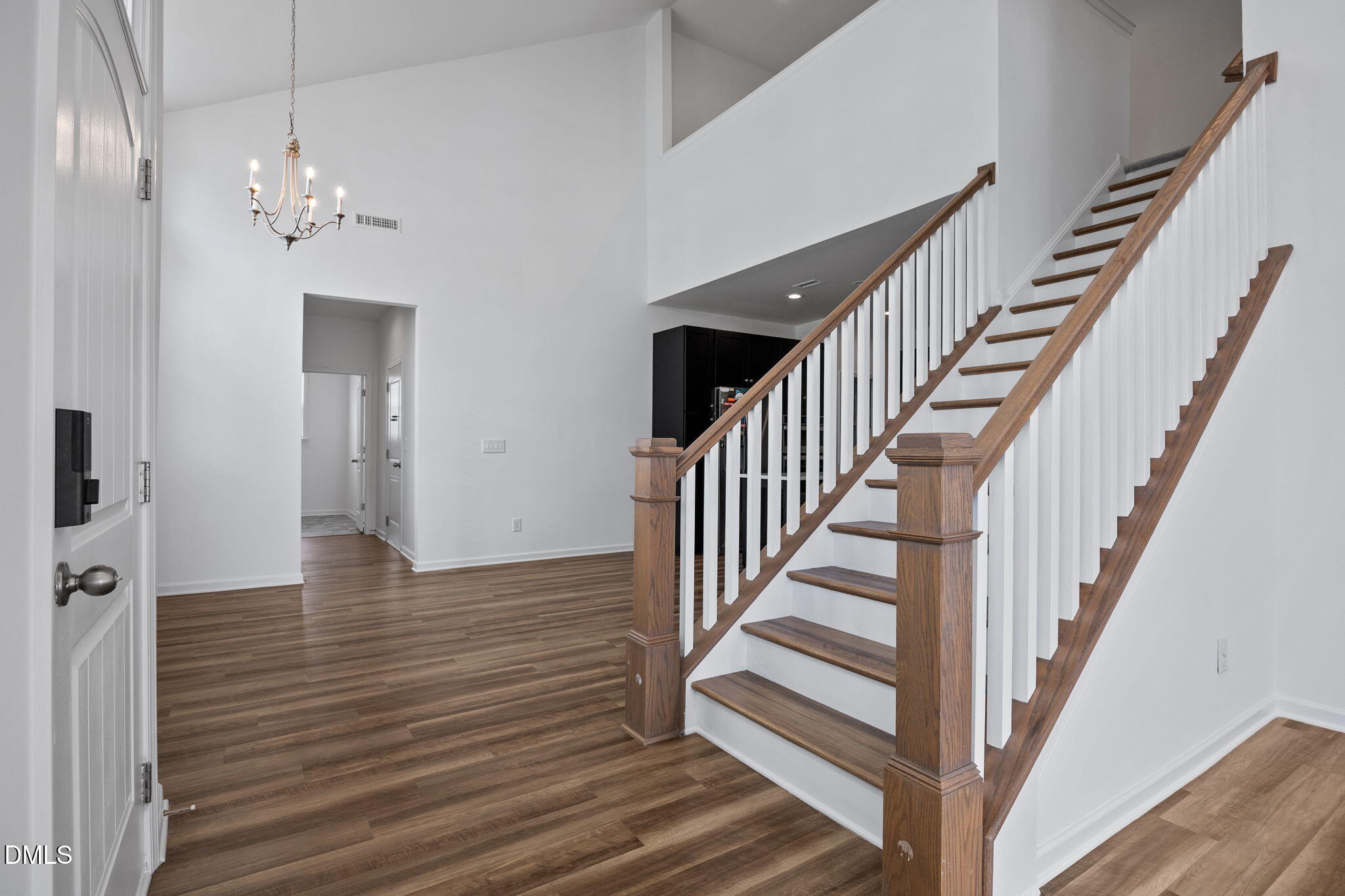 902 Talbot Place Durham, NC 27703 - Photo 31 of 49 a view of a hallway with wooden floor and staircase