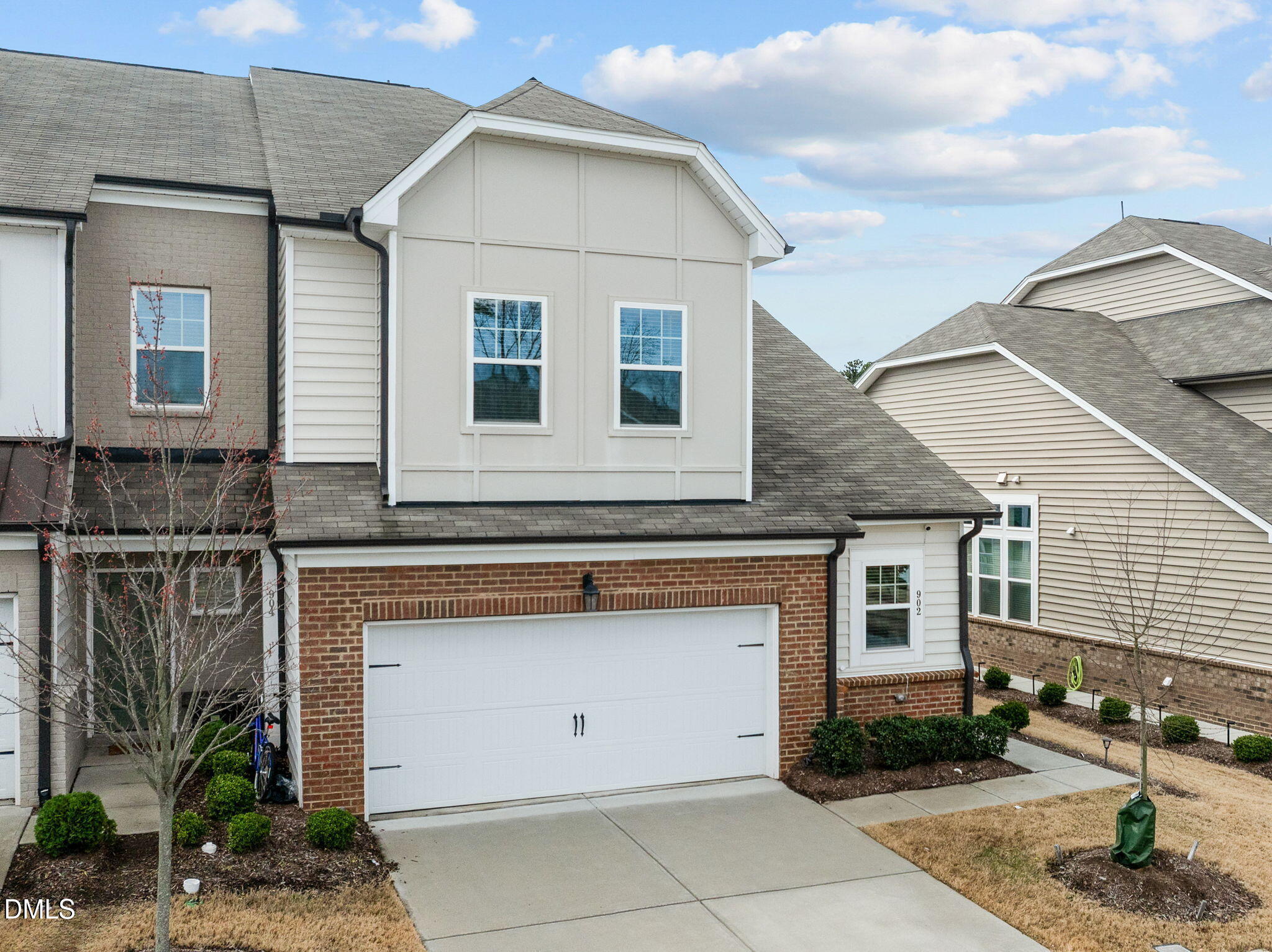 902 Talbot Place Durham, NC 27703 - Photo 4 of 49 a front view of a house with garden