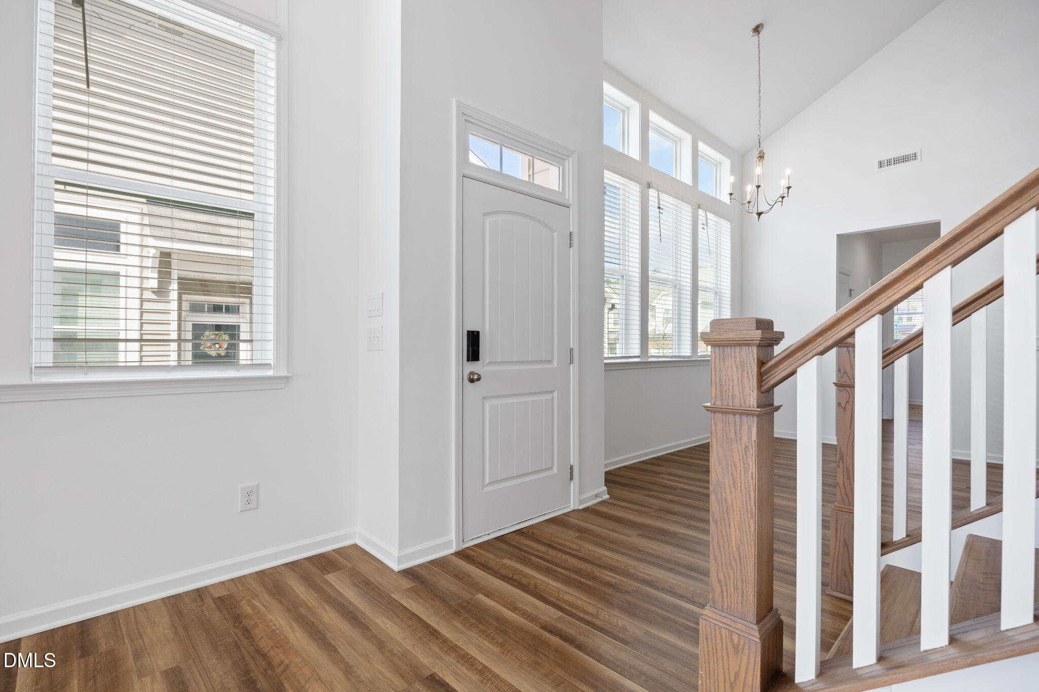 902 Talbot Place Durham, NC 27703 - Photo 6 of 49 a view of a hallway with wooden floor and entryway