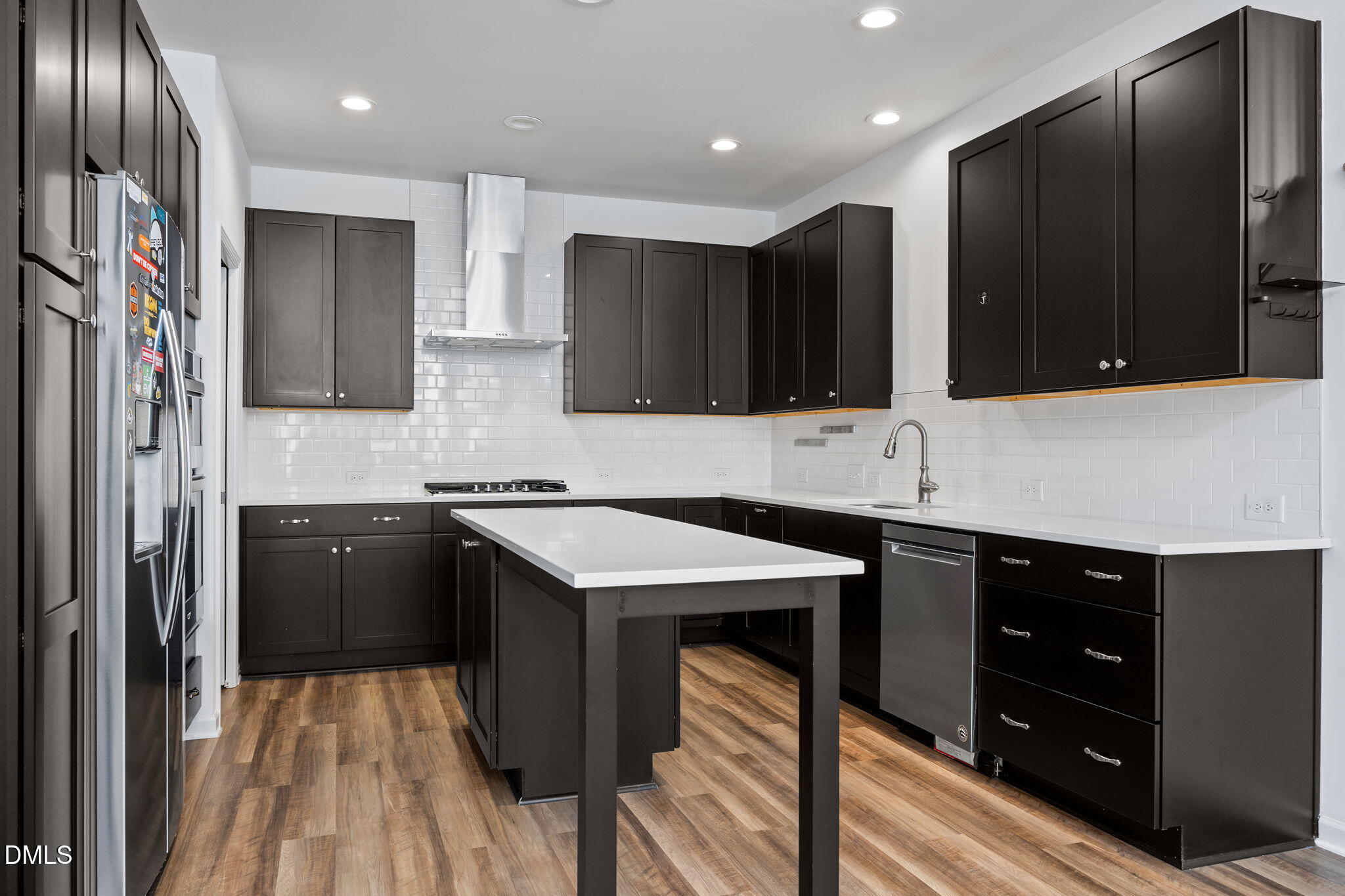 902 Talbot Place Durham, NC 27703 - Photo 9 of 49 a kitchen with a sink a stove and cabinets