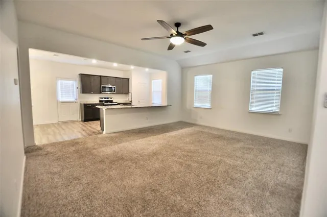 a view of kitchen and microwave