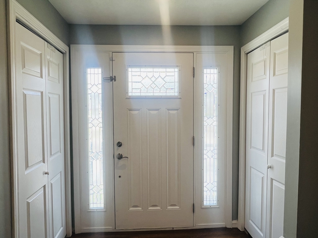 35 Pearl Street, Unit 35 Randolph, MA 02368 - Photo 16 of 31 a view of front door with wooden floor
