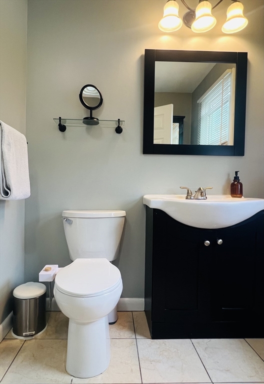 35 Pearl Street, Unit 35 Randolph, MA 02368 - Photo 27 of 31 a bathroom with a sink and a toilet