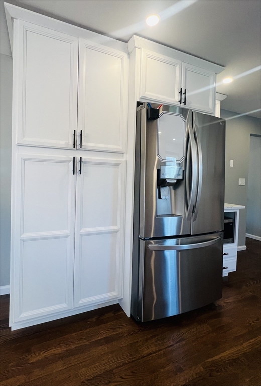 35 Pearl Street, Unit 35 Randolph, MA 02368 - Photo 7 of 31 a metallic refrigerator freezer sitting in a kitchen