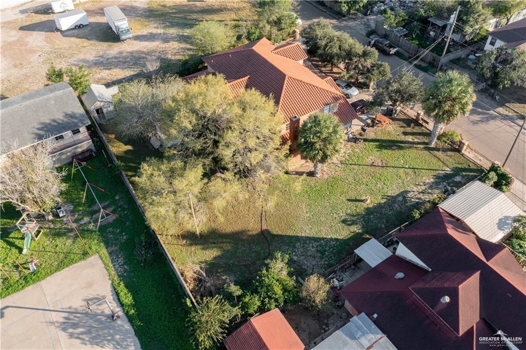 933 East 4th Street Roma, TX 78584 - Photo 13 of 15 an aerial view of a house with a yard
