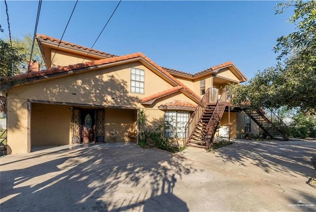 933 East 4th Street Roma, TX 78584 - Photo 2 of 15 a view of a house with a yard