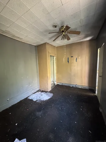 a kitchen with a stove and a refrigerator