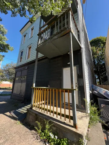 a view of a house with a deck