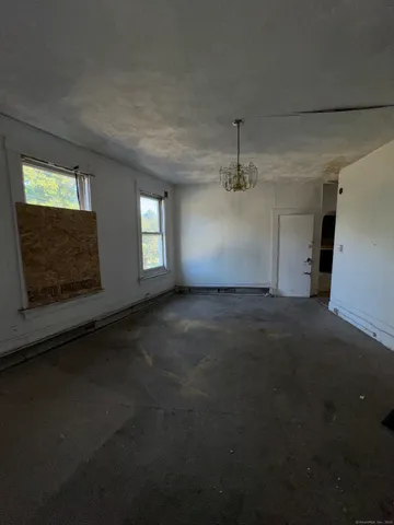 a view of a big room with carpet