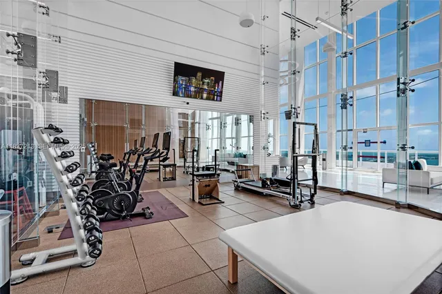 a picture of a room with a floor to ceiling window