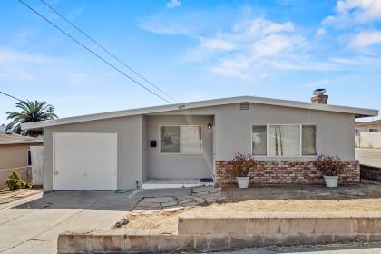 1699 Highland Street Seaside, CA 93955 - Photo 1 of 24 a view of a house with a yard