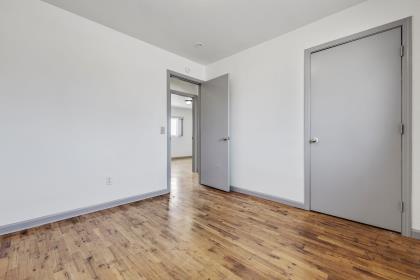 1699 Highland Street Seaside, CA 93955 - Photo 11 of 24 a view of an empty room with wooden floor