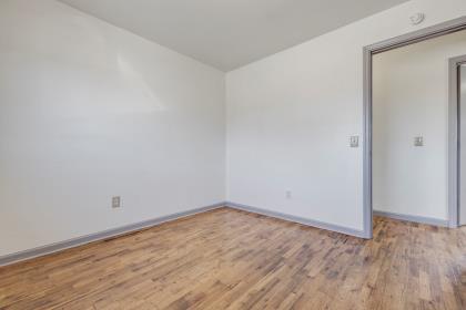 1699 Highland Street Seaside, CA 93955 - Photo 18 of 24 a view of an empty room with wooden floor