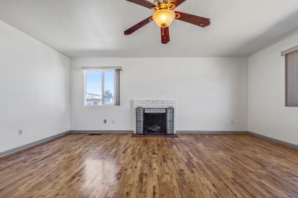 1699 Highland Street Seaside, CA 93955 - Photo 7 of 24 an empty room with windows and fireplace