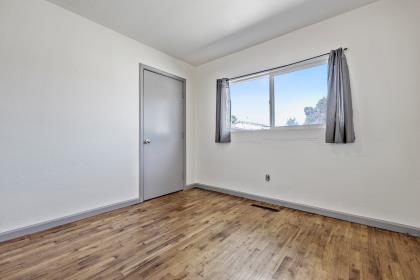 1699 Highland Street Seaside, CA 93955 - Photo 10 of 24 a view of empty room with wooden floor and fan
