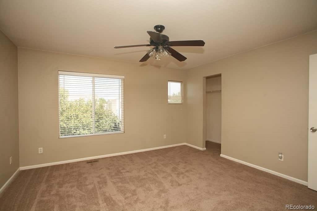 4067 Andes Way Denver, CO 80249 - Photo 2 of 4 a view of an empty room and a window