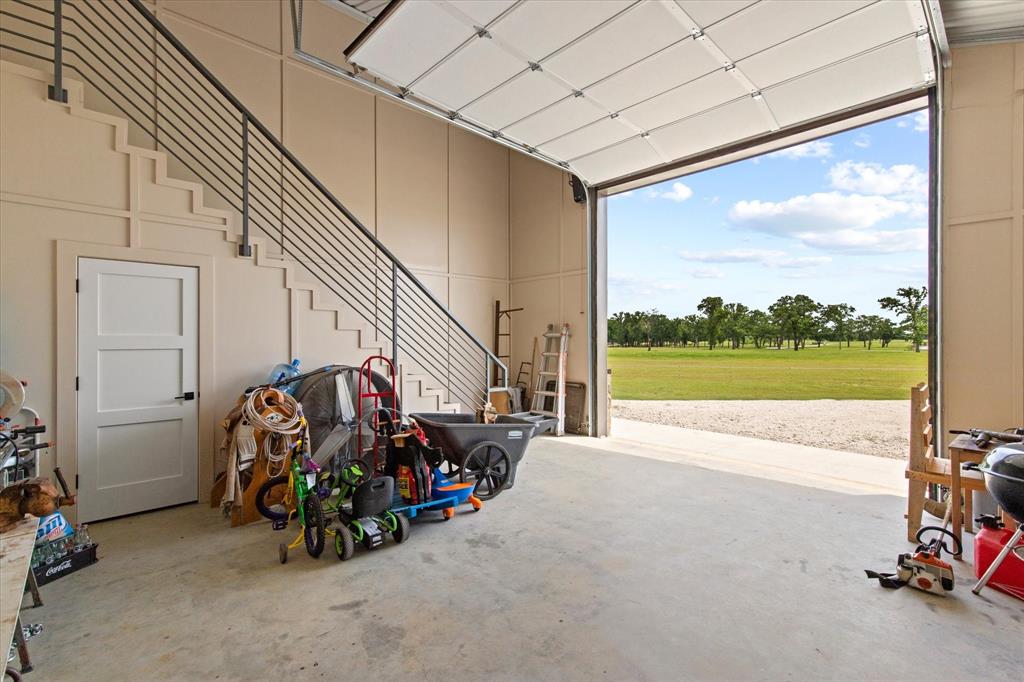 10701 Osburn Road Pilot Point, TX 76258 - Photo 28 of 37 Shop door overhead door