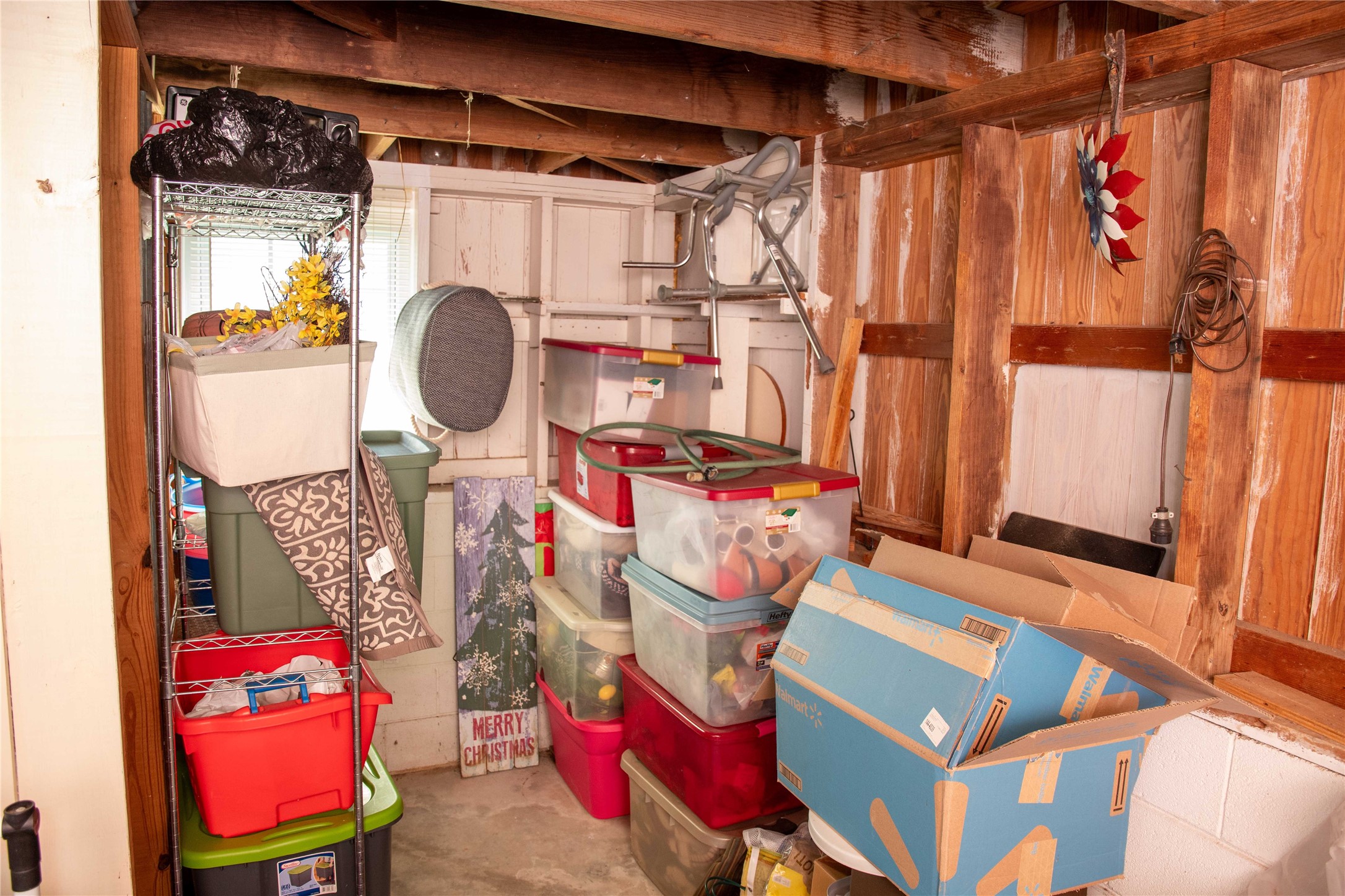 407 Rorem Avenue Palacios, TX 77465 - Photo 15 of 18 a view of walk in closet with clothes and shoes