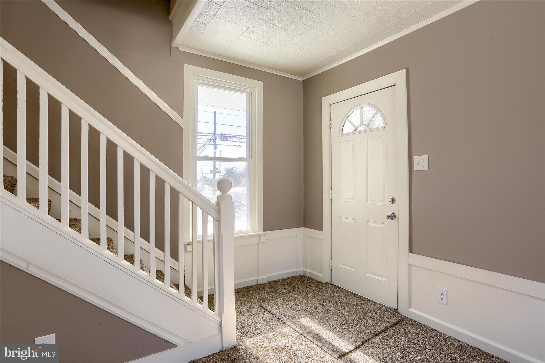 801 North Mountain Road Harrisburg, PA 17112 - Photo 13 of 32 a view of a hallway with windows and stairs