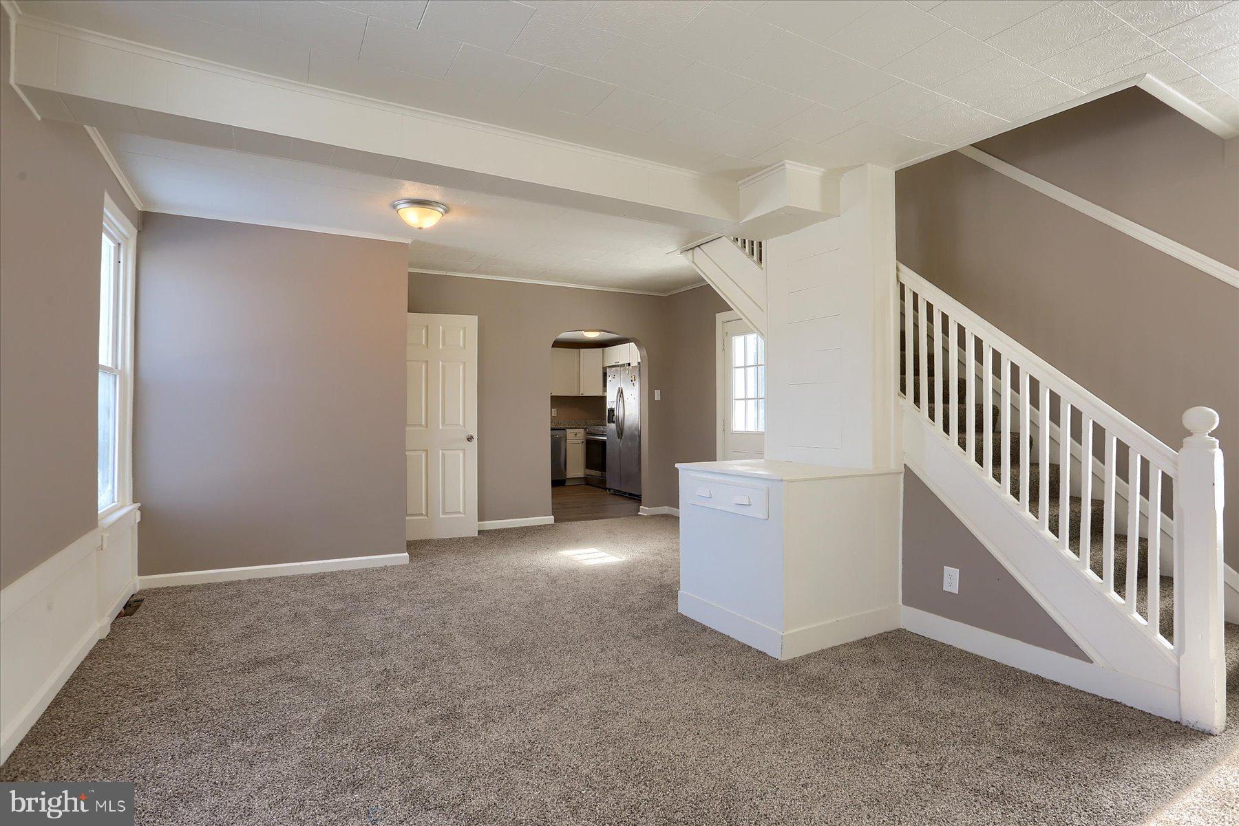 801 North Mountain Road Harrisburg, PA 17112 - Photo 14 of 32 a view of an empty room with stairs and a window