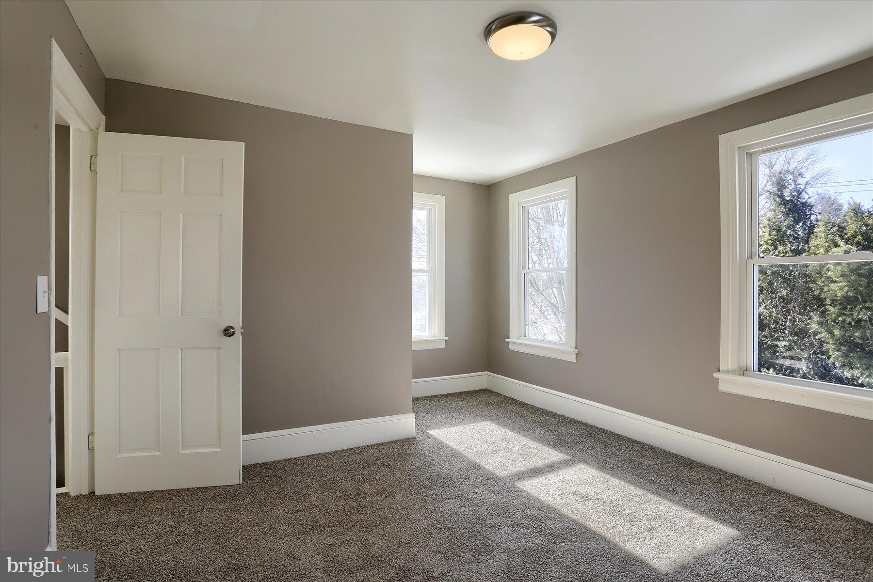 801 North Mountain Road Harrisburg, PA 17112 - Photo 21 of 32 a view of an empty room with window and closet area