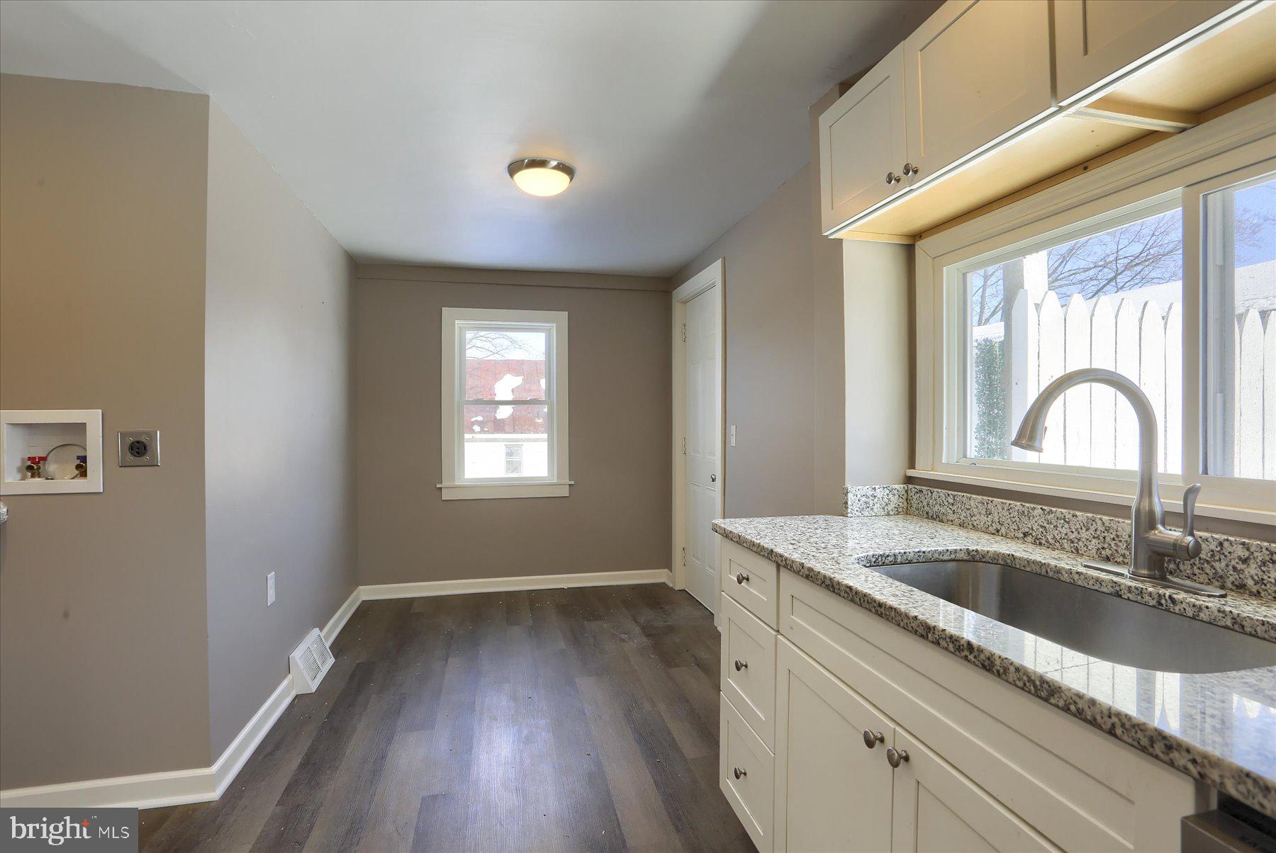 801 North Mountain Road Harrisburg, PA 17112 - Photo 10 of 32 a view of a sink and dishwasher with wooden floor