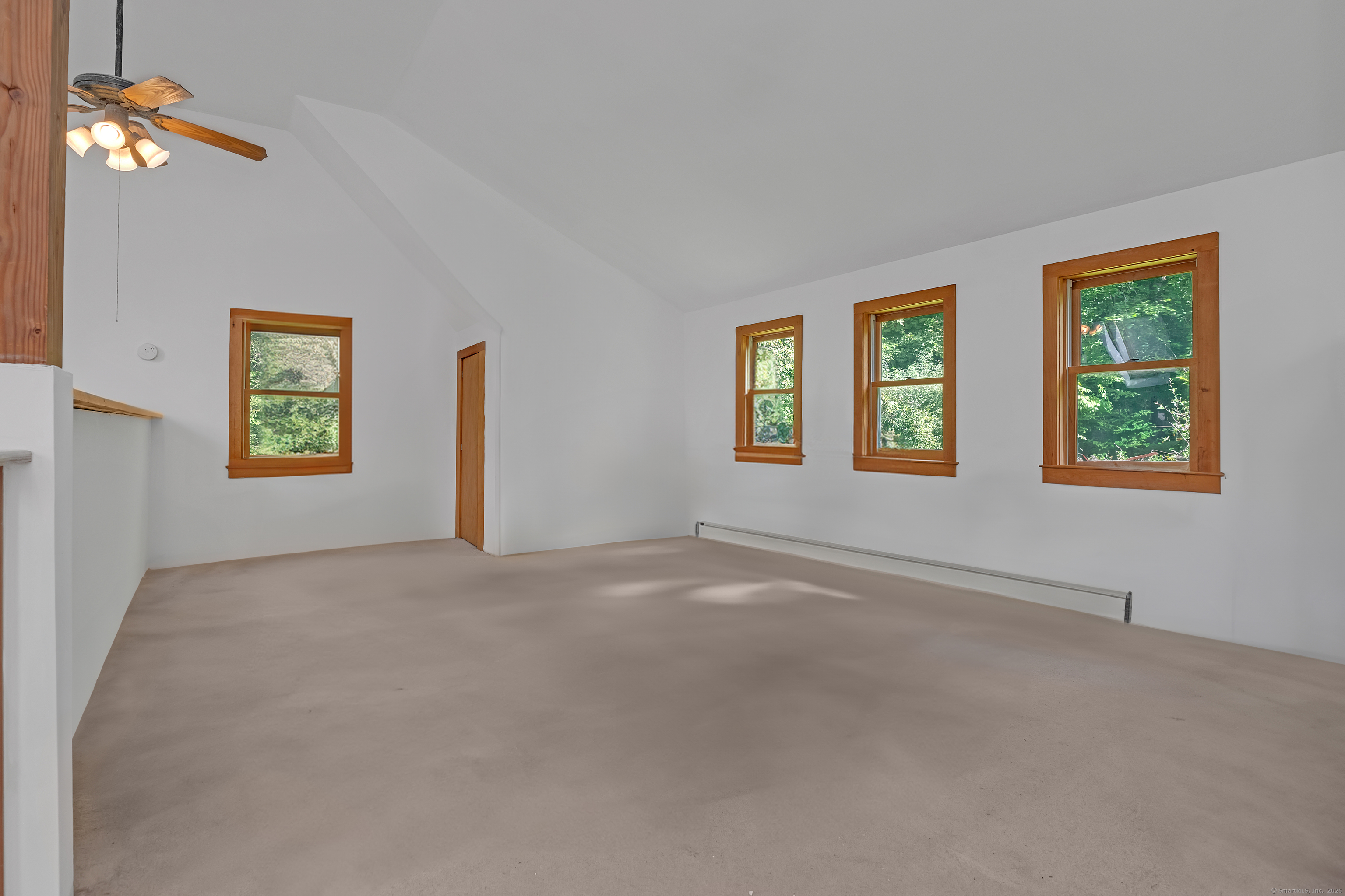 55 Mallory Road Roxbury, CT 06783 - Photo 24 of 34 a view of an empty room with windows
