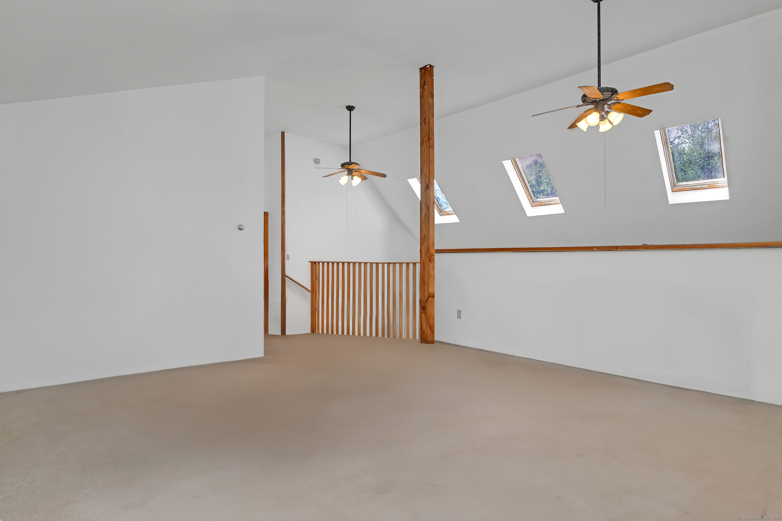 55 Mallory Road Roxbury, CT 06783 - Photo 25 of 34 a view of a livingroom with a ceiling fan