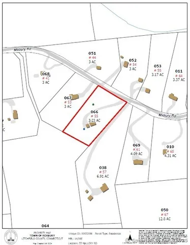 a room with water heater and wooden cabinets