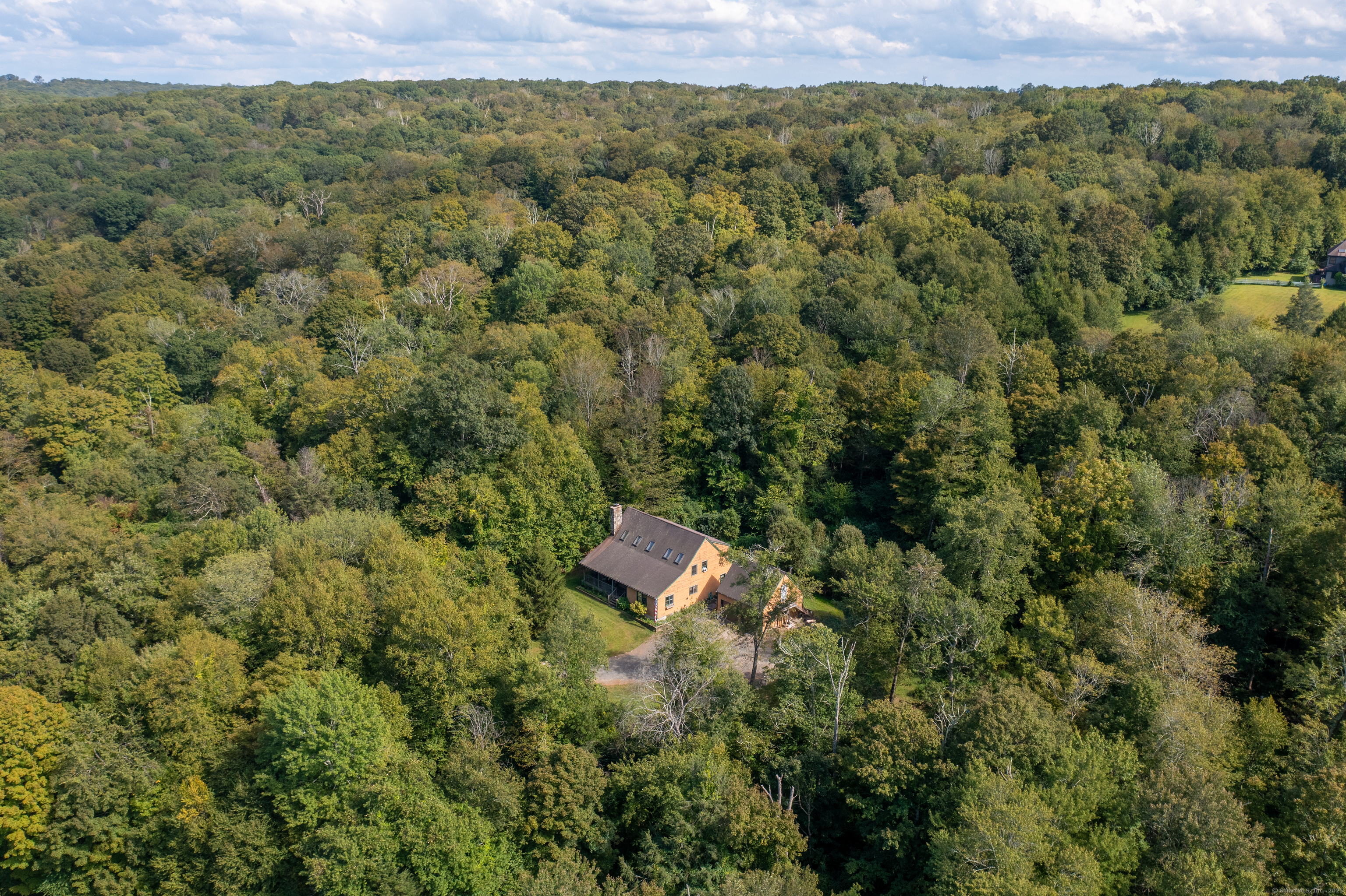 55 Mallory Road Roxbury, CT 06783 - Photo 4 of 34 an aerial view of a house with a yard